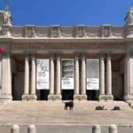Roman architectural stone facade and elegant luxury window detail evoking Fendi heritage in Rome.
